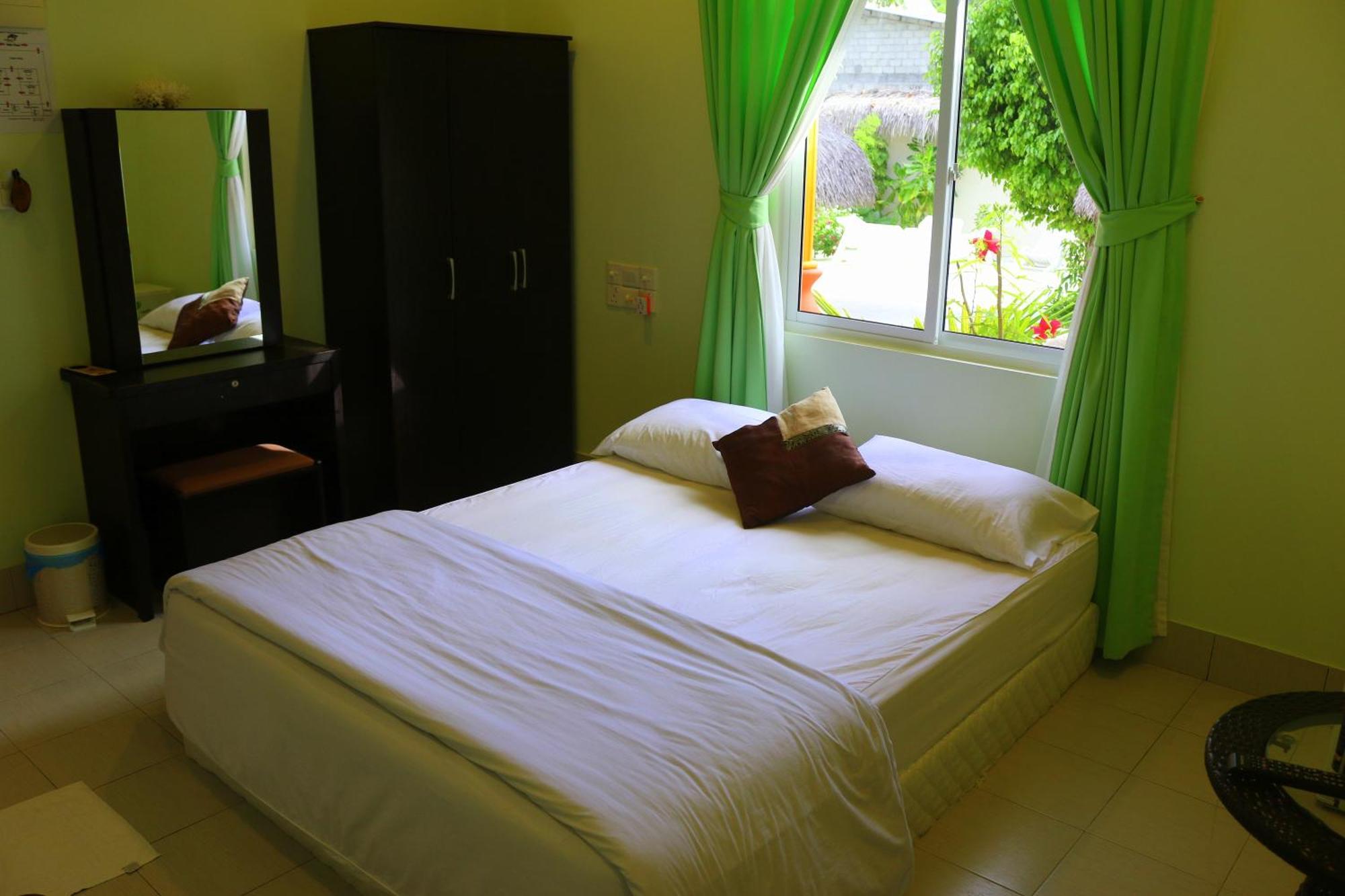 Ras Beach Inn Rasdhoo Buitenkant foto